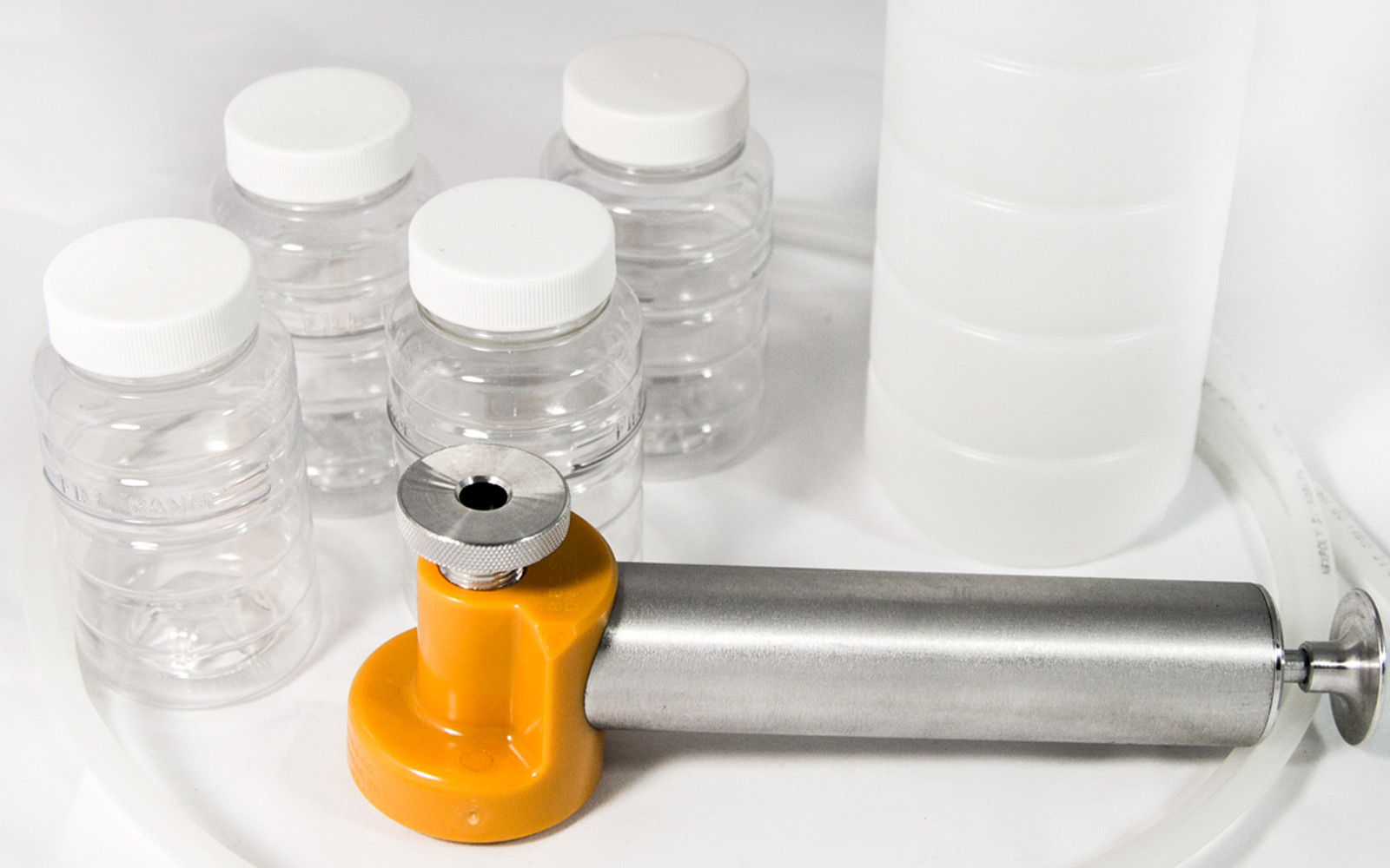 Oil sampling kit with bottles and vacuum pump