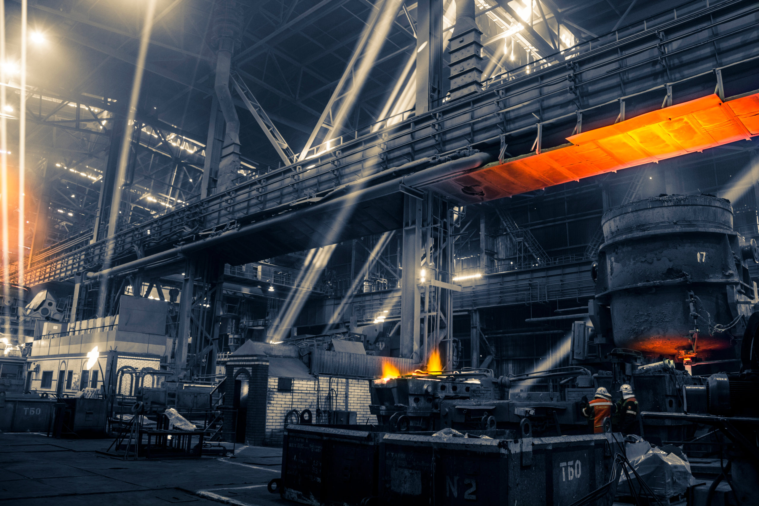 Iron and steel works factory with sun beam Iron and steel works factory with sun beam
